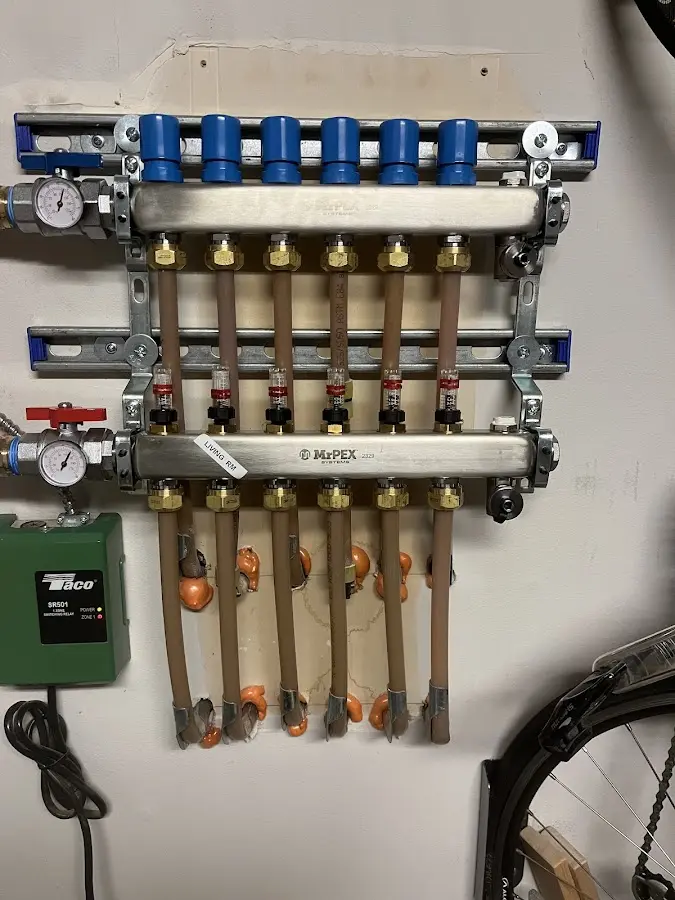 Plumber performing Water Heater Repair at a residential property in Carson